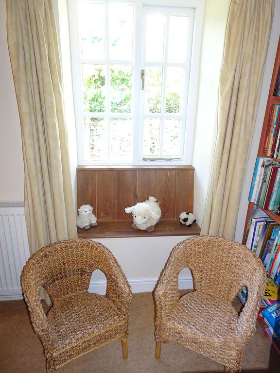 bookshelf chairs toys cottage